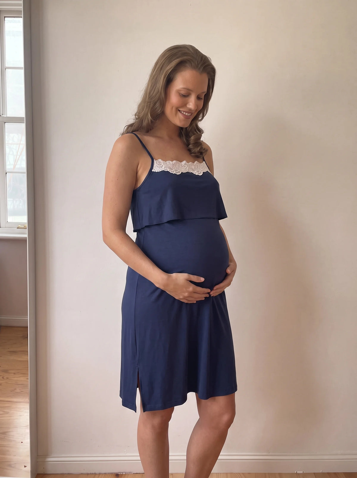 Navy nursing nightgown with thin straps, ivory lace neckline, lift up top layer and side slit