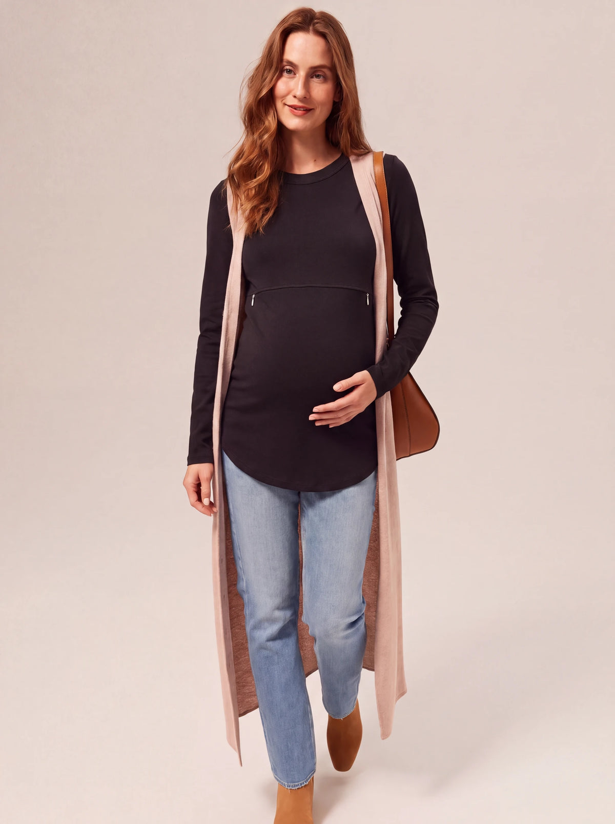 Black nursing tee styled with a long cardigan and jeans