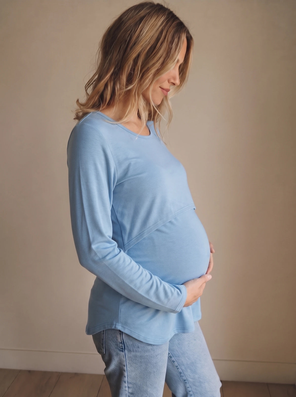 Dusty blue double layer nursing top side view over the bump