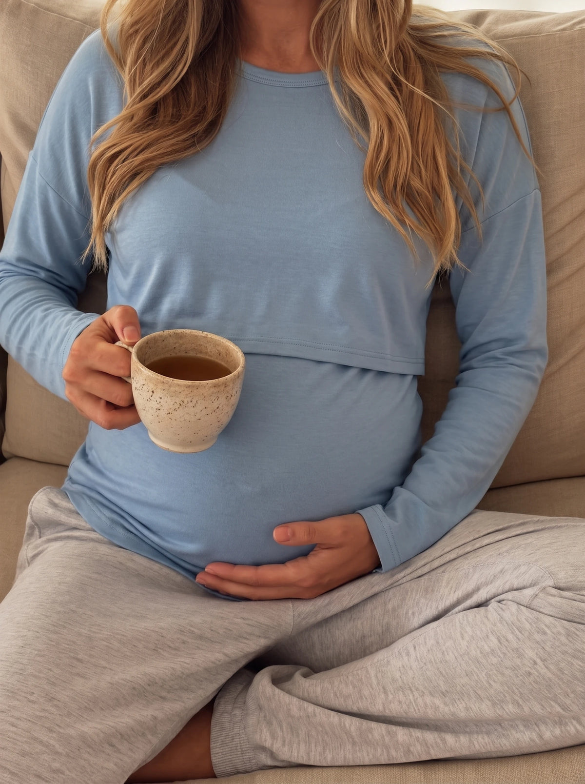 Soft stretch cotton dusty blue nursing top with a cup of tea