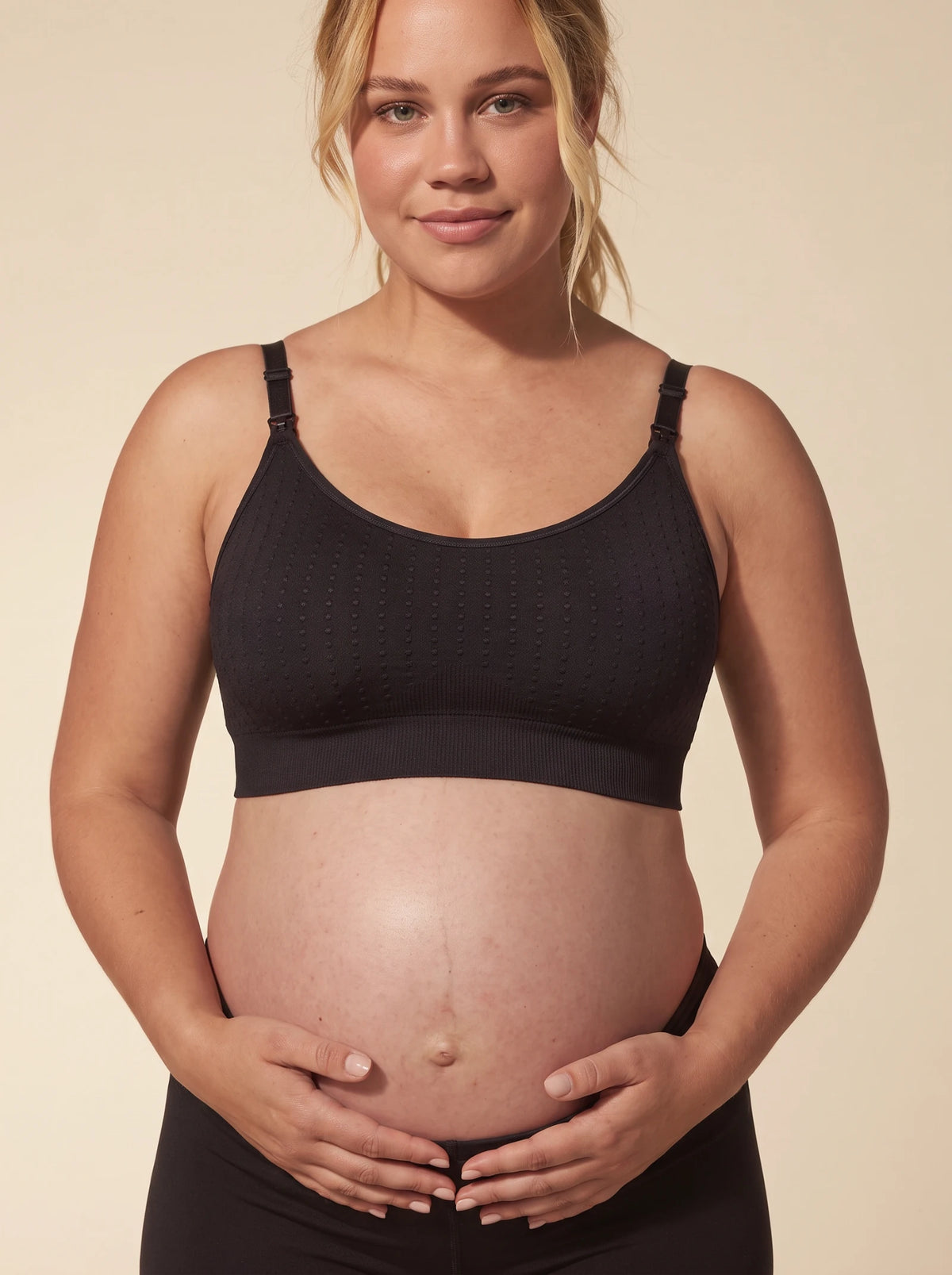 AURA nursing bra in Black worn by a pregnant mom