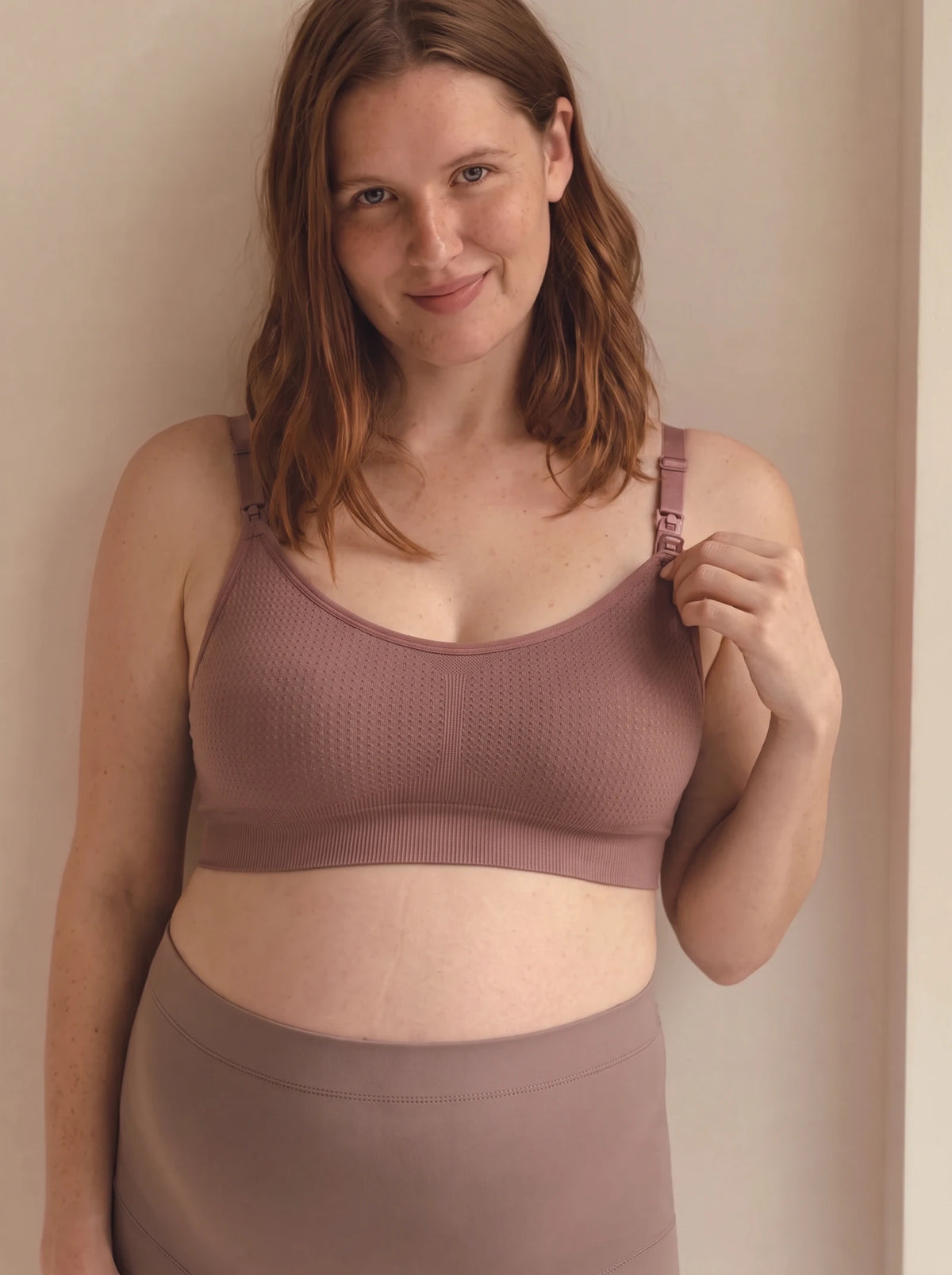 AURA nursing bra in Coffee worn by a pregnant mom