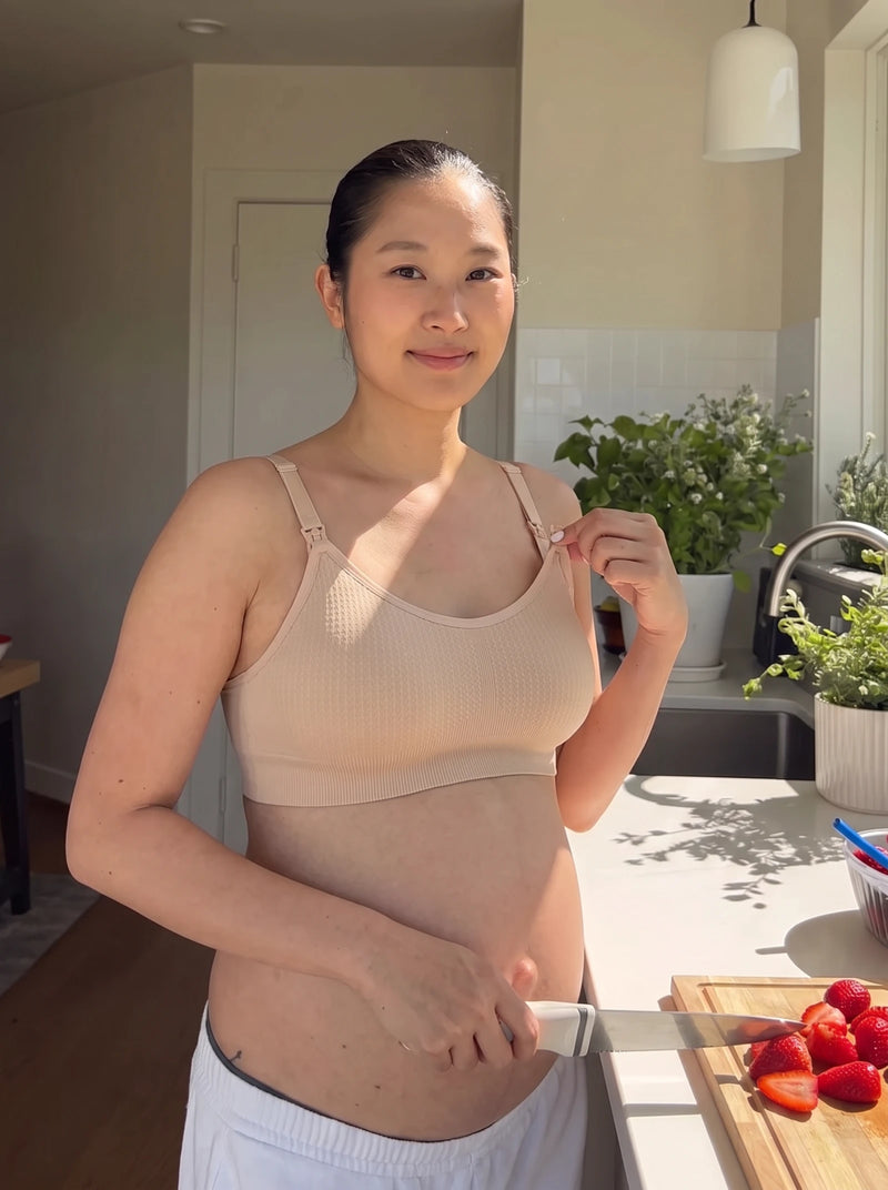 Mom wearing the AURA nursing bra