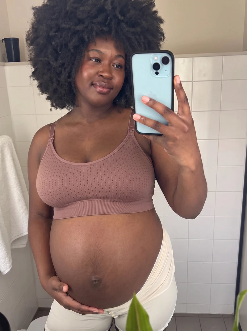 Mom wearing the AURA nursing bra