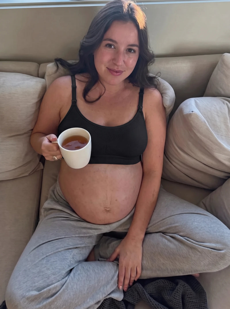 Mom wearing the AURA nursing bra