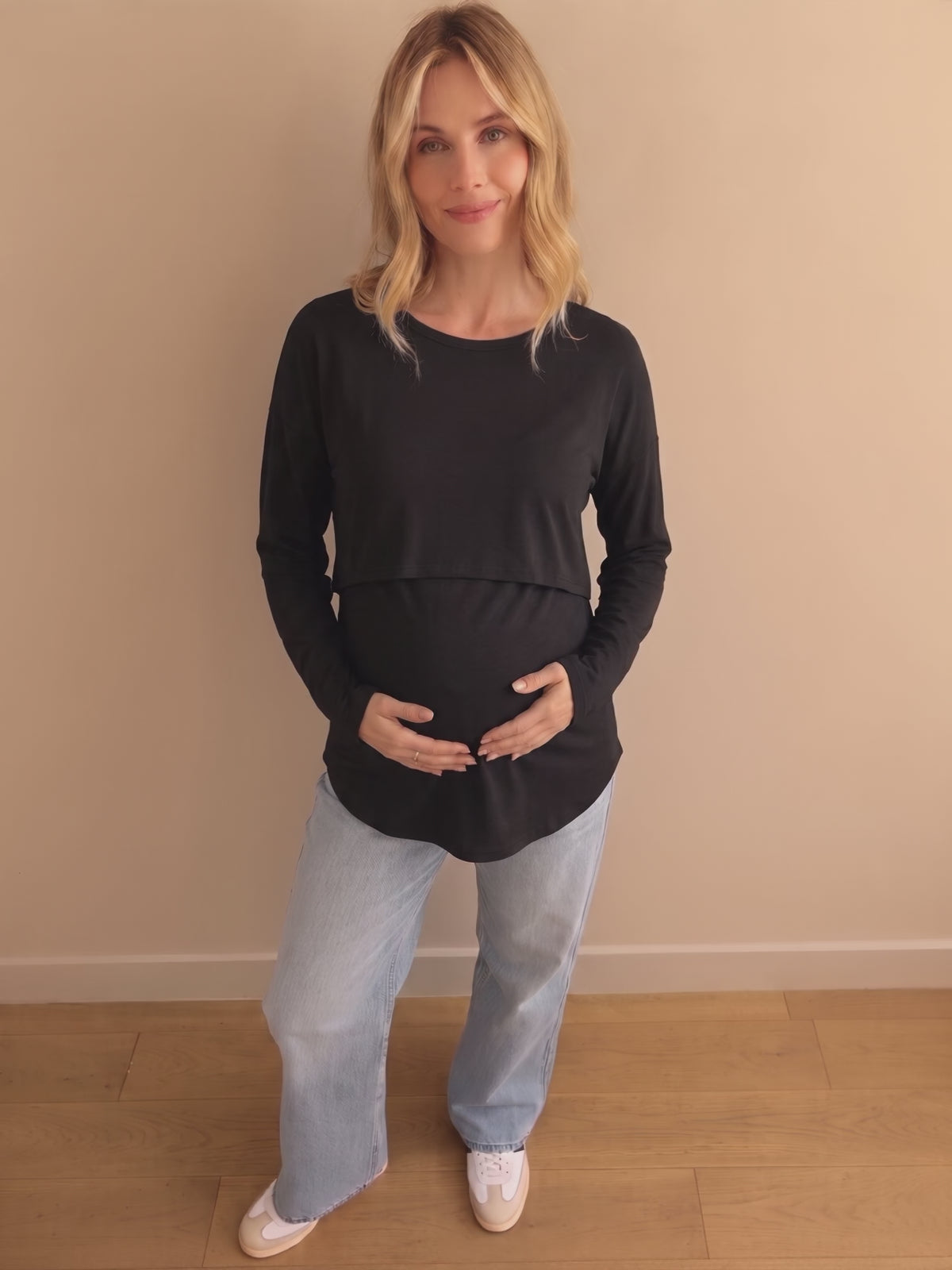 Black layered nursing top shown from the front, side and back
