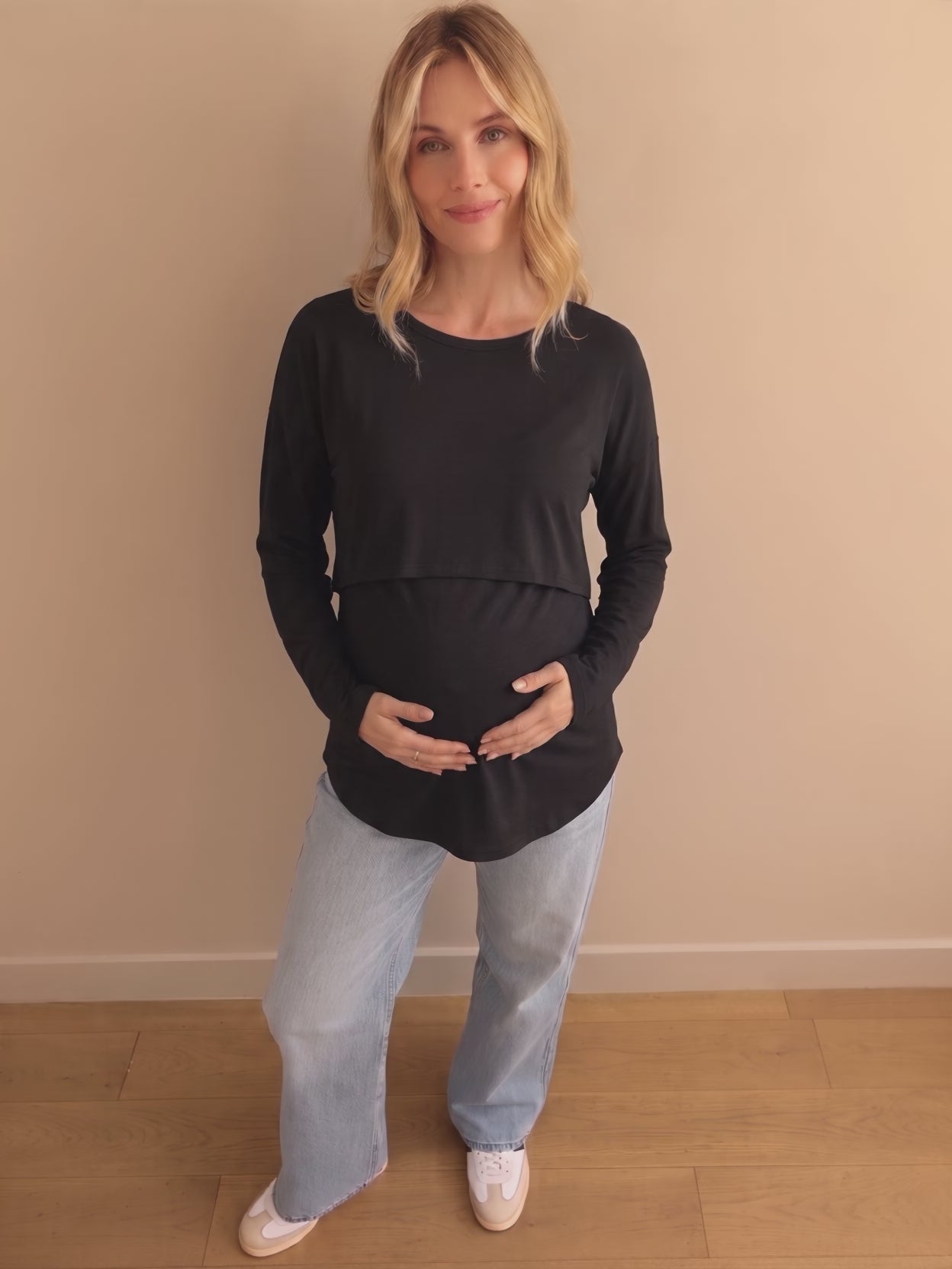 Black layered nursing top shown from the front, side and back
